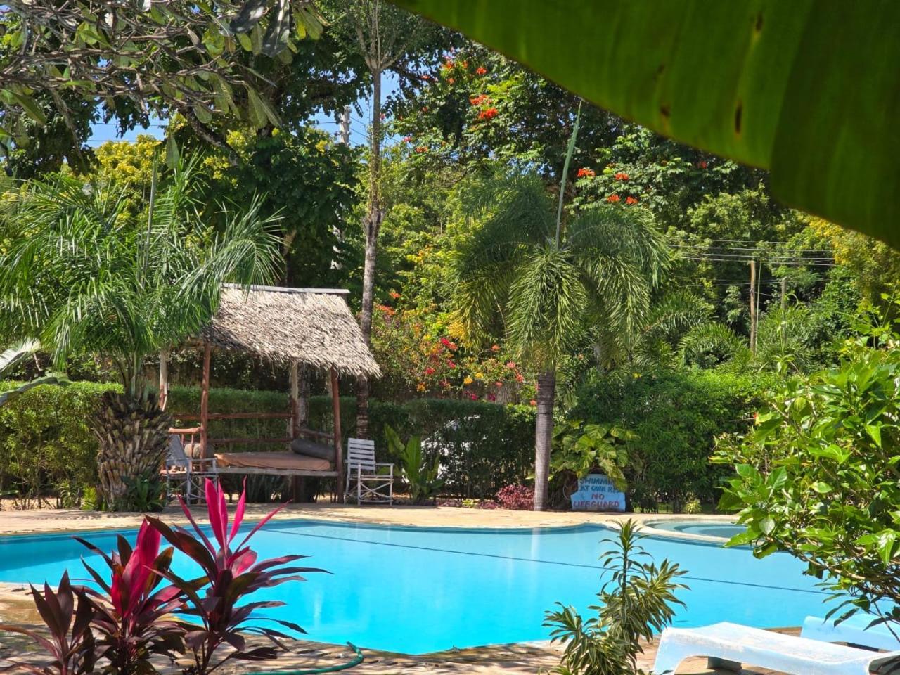 Oasis Diani Beach Villas Экстерьер фото